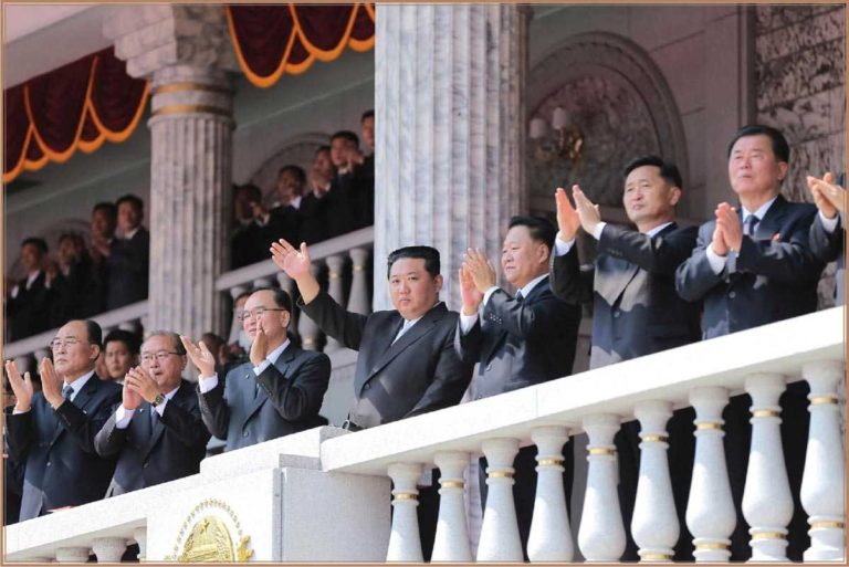 The respected Comrade Kim Jong Un warmly waved back to the enthusiastically cheering crowds.