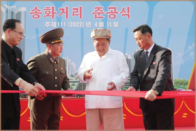 The respected Comrade Kim Jong Un cut the ribbon at the inaugural ceremony of Songhwa Street.