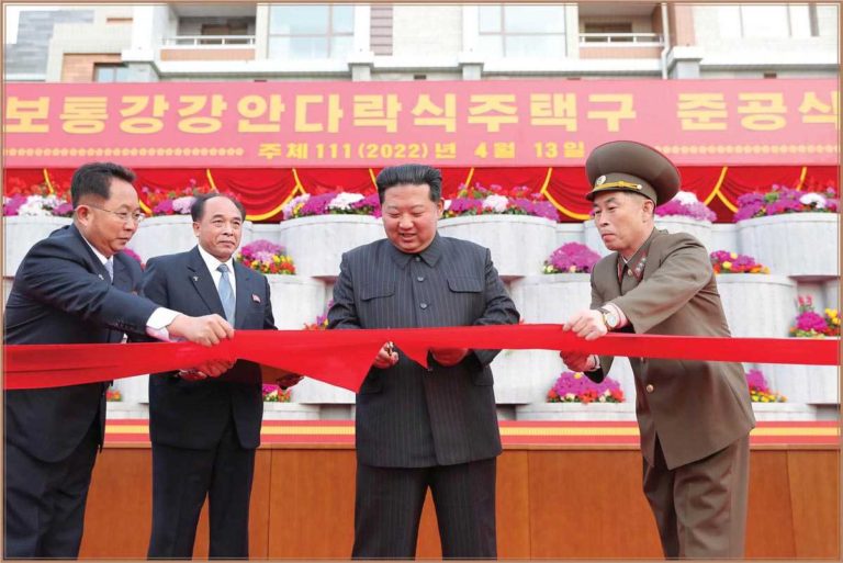 The respected Comrade Kim Jong Un cut the ribbon to inaugurate the Pothong Riverside Terraced Houses District.