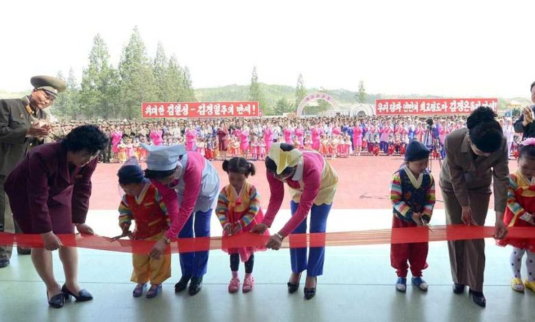 Orphans cutting the tape at the inauguration ceremony of the Wonsan Baby Home and Orphange