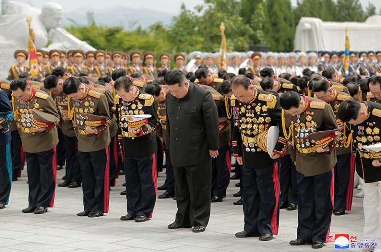 Kim Jong Un paying a noble tribute to the martyrs of the great years